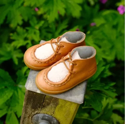 Chausson cuir fourré bébé sales